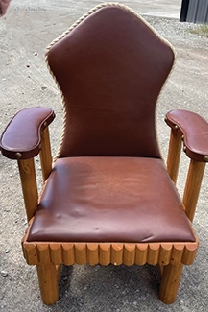 Original New West Leather and  Original New West Leather and Wood Occasional Chair with Casters in Perfect Condition $1250. Call 406-897-4962 ___________________